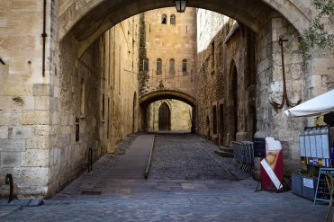 The alleyway through the old city of Narbonne next to the Palace of the Archbishop