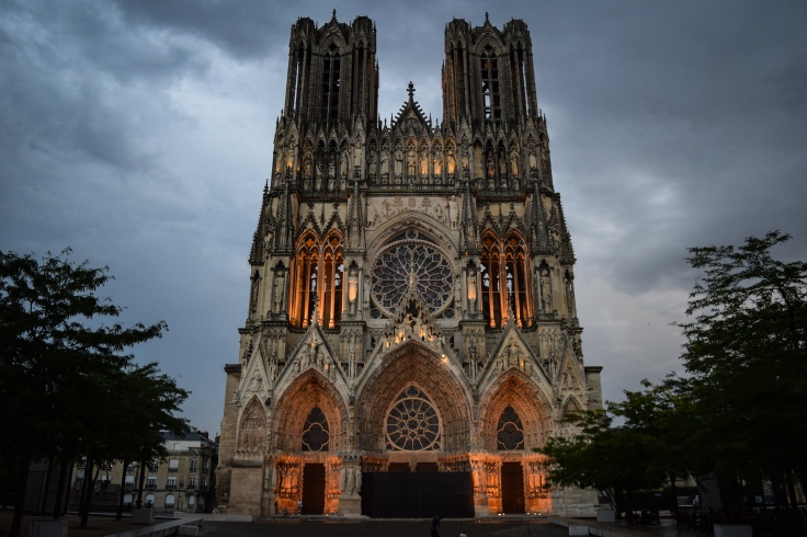 The facade of the Reims Cathedral at dusk
