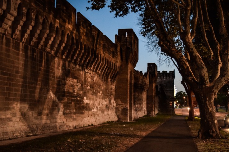 The imposing 14th century walls and towers enclosing Avignon