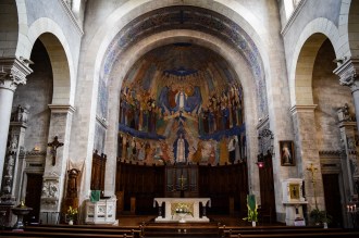 The religious murals painted on the ceiling inside the Eglise Notre-Dame in Clisson